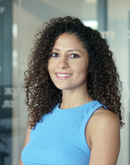 Hajar who is head of adtech business team smiling at camera