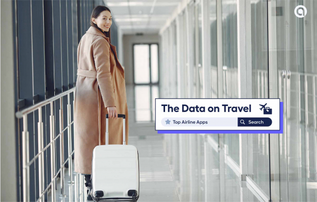 young brunette woman at airport with suitcase and long coat