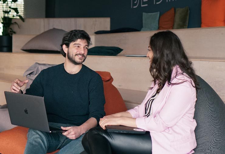 Two people are having a discussion